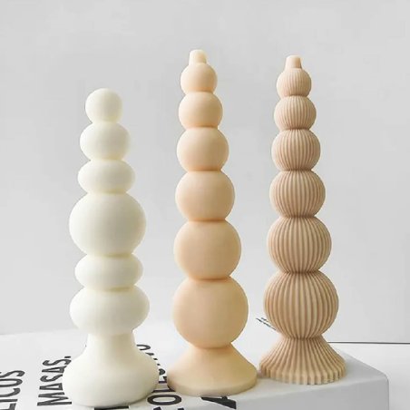 Haz velas decorativas modernas con este molde cilíndrico de esferas lisas y estriadas. Flexible, original y fácil de usar. - Cóm