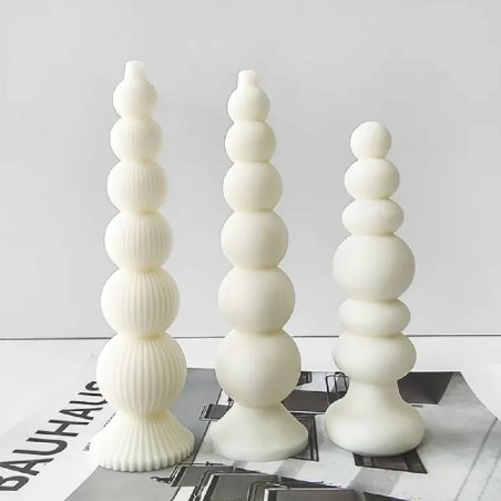 Haz velas decorativas modernas con este molde cilíndrico de esferas lisas y estriadas. Flexible, original y fácil de usar. - Cóm