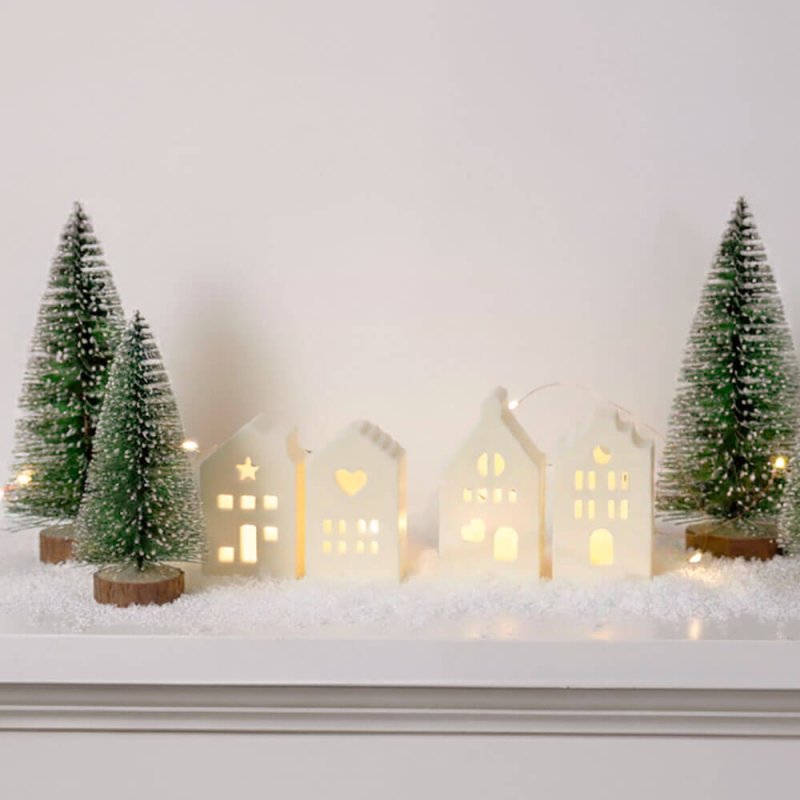 Molde de silicona con 4 casitas navideñas decoradas. Ideal para hacer figuras con cera, jabón o cemento. Flexible, reutilizable 