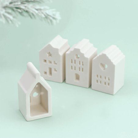 Molde de silicona con 4 casitas navideñas decoradas. Ideal para hacer figuras con cera, jabón o cemento. Flexible, reutilizable 