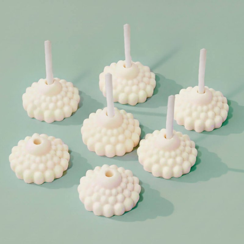 Molde de silicona con 6 cavidades para hacer remates decorativos de velas. Flexible y antiadherente, ideal para acabados elegant