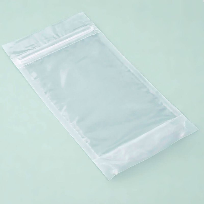 Bolsa de polipropileno, transparente y estable, con base y cierre zip. Tamaño 110×185×65 mm. Ideal para sales, polvos y producto